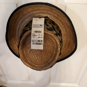 Vintage hat with leopard scarf.